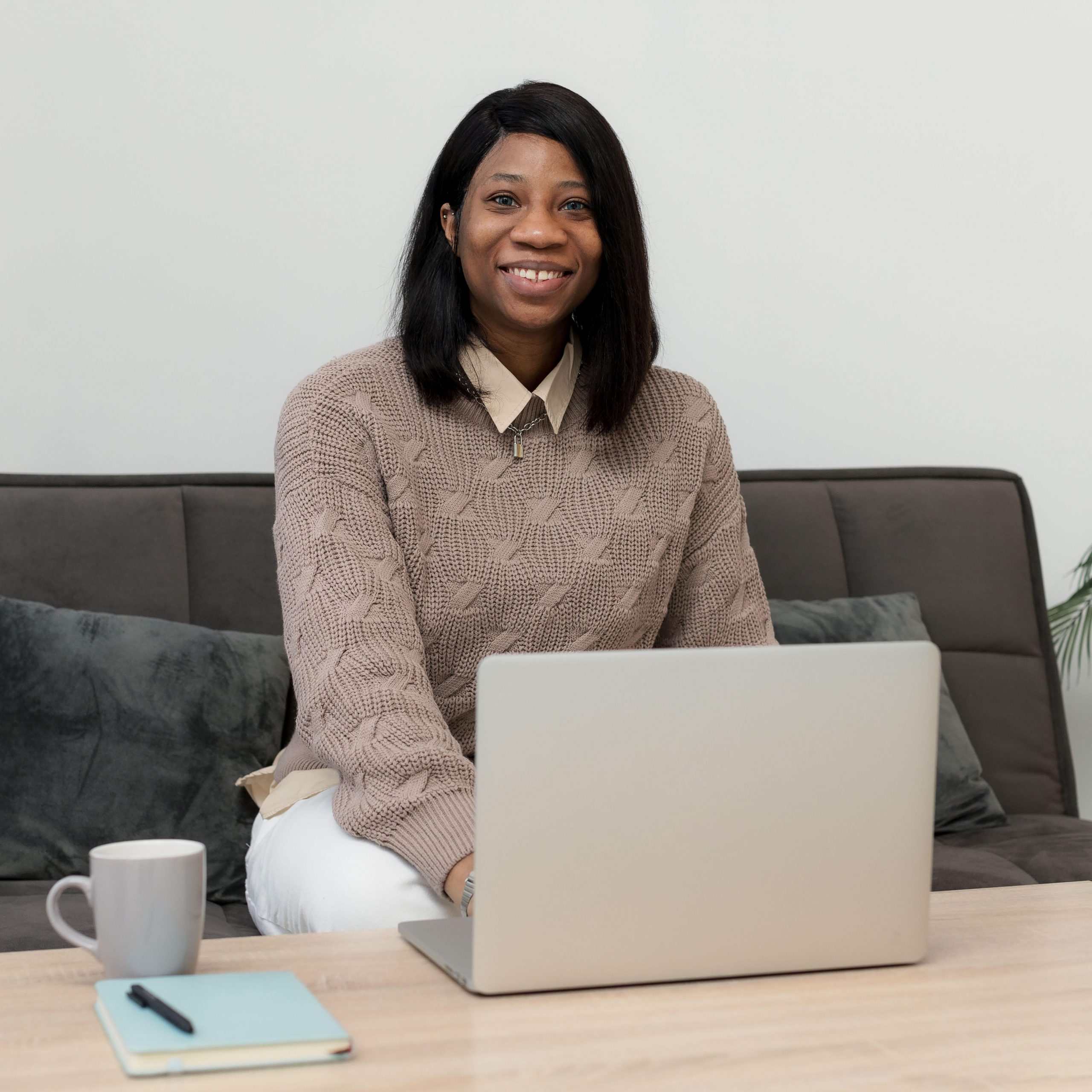 smiley-businesswoman-working-laptop